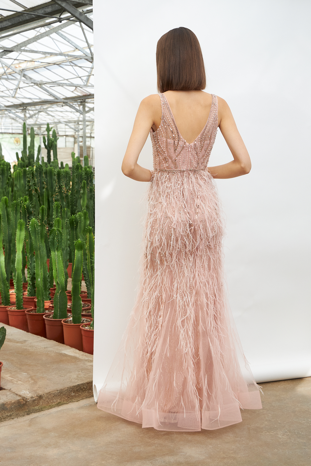 Evening Dresses / Long evening fully beaded dress with feathers