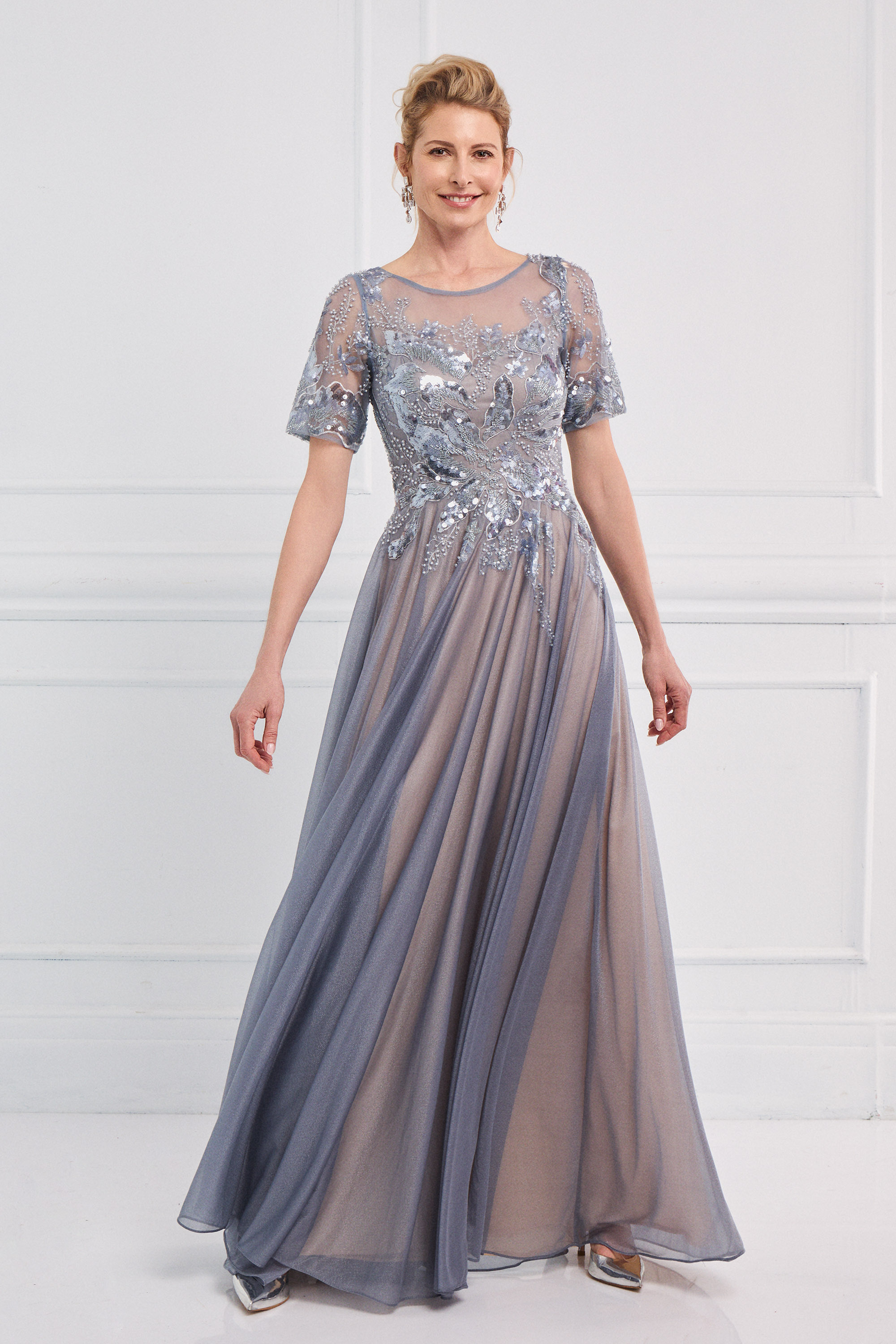 Classic Dresses / Classic long dress made of shiny fabric with fully embroidered top and 3/4 sleeves