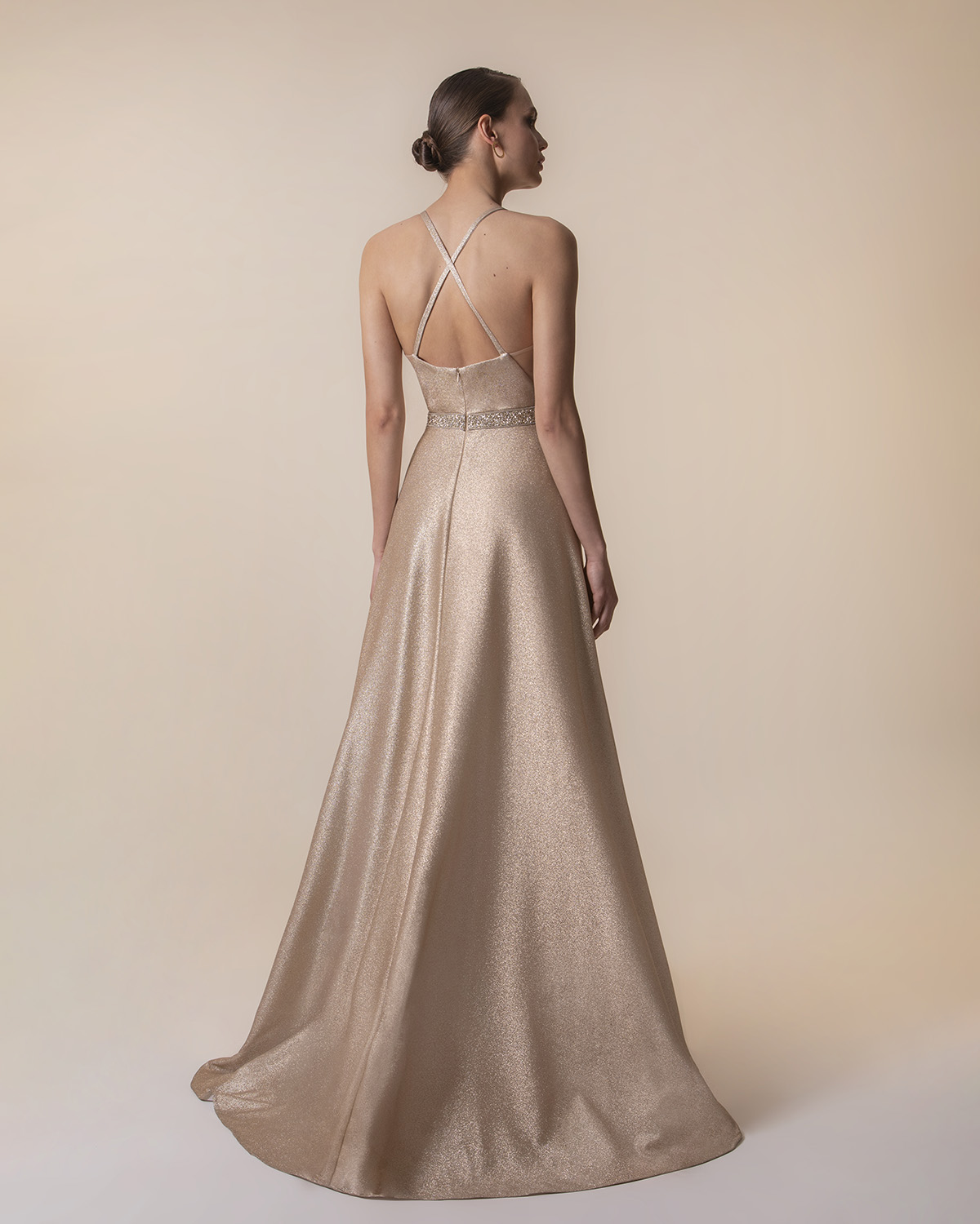 Evening Dresses / Long evening dress with shining fabric and beading around the waist
