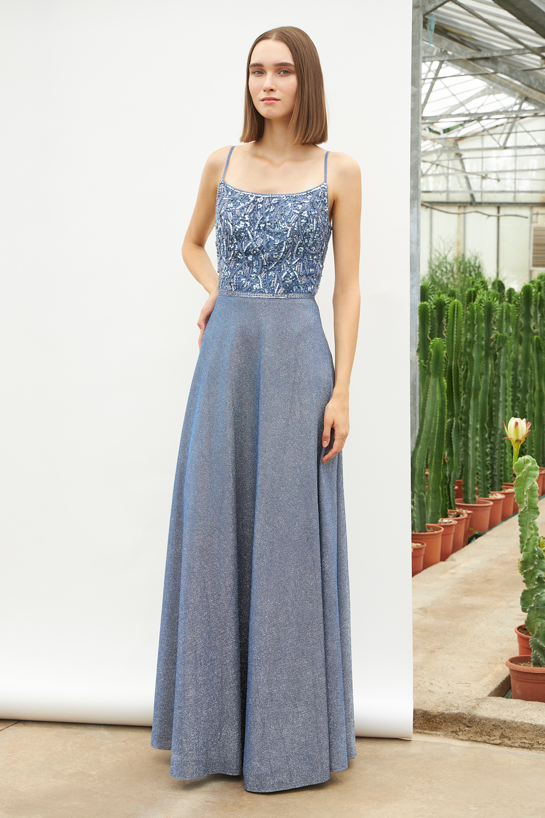 Evening Dresses / Long evening dress with shining fabric and beaded top