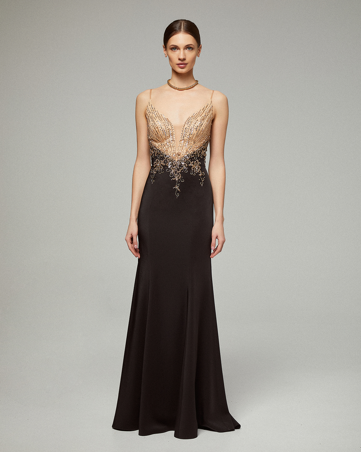 Long evening dress with beading on the top and open back