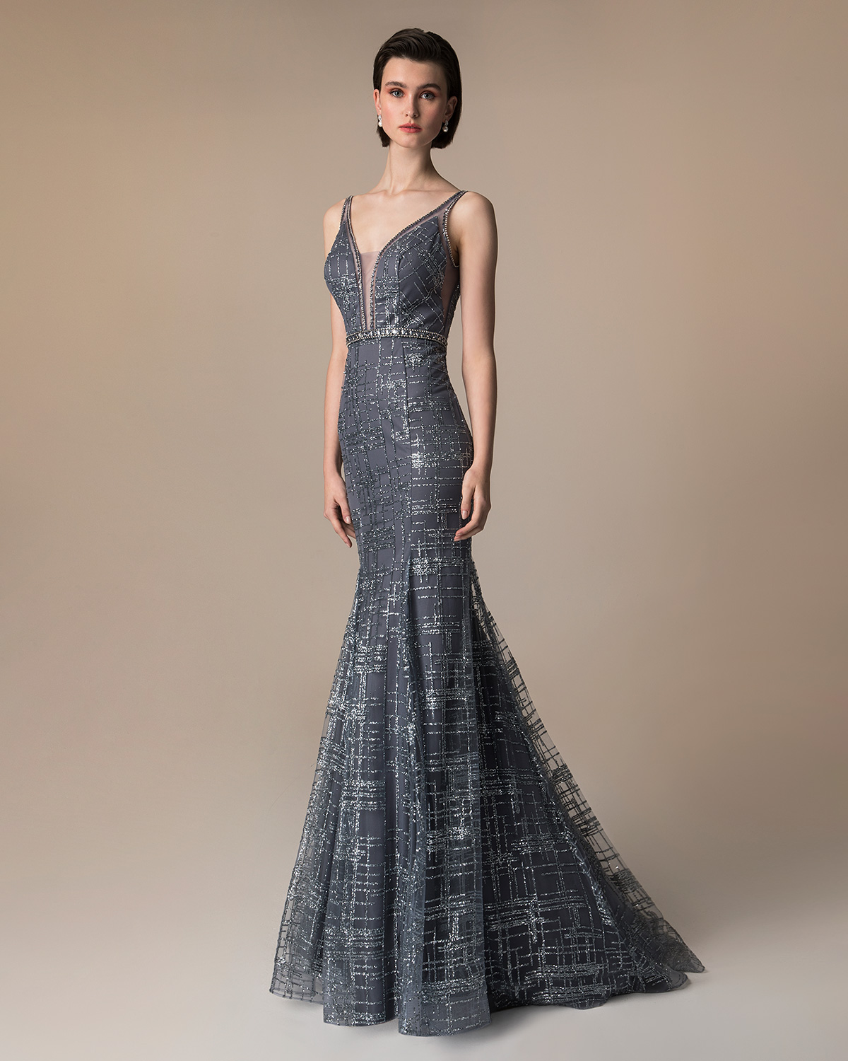 Long evening beaded dress with beading on the waist