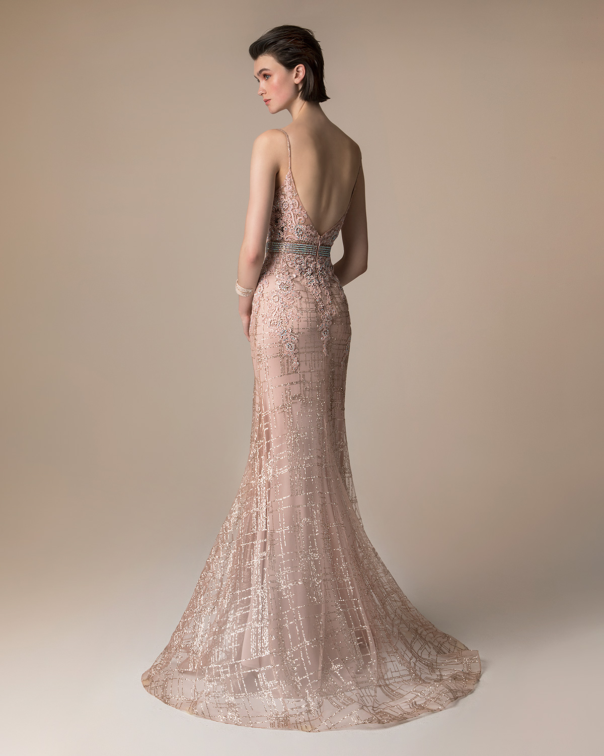 Long evening beaded dress with beading on the waist