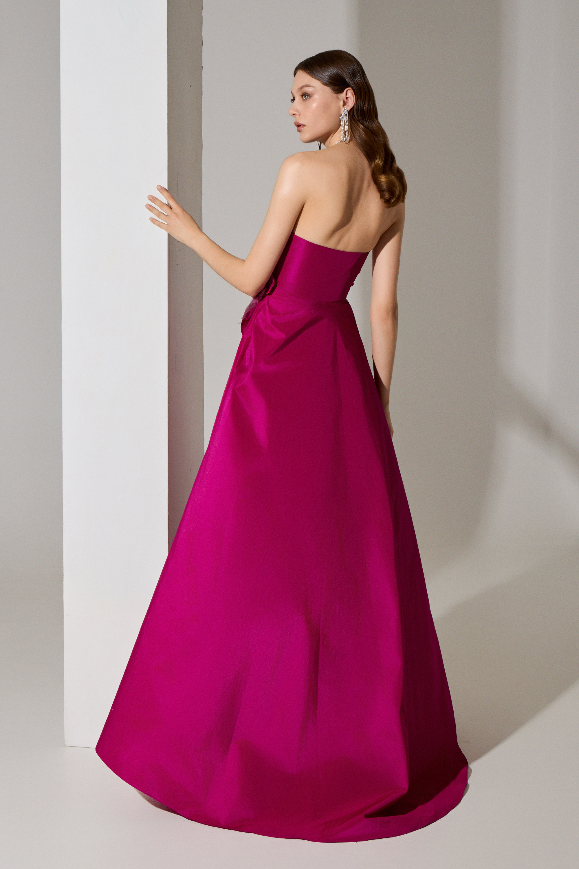 Evening Dresses / Evening long strapless dress with a flower and embroidery on the side