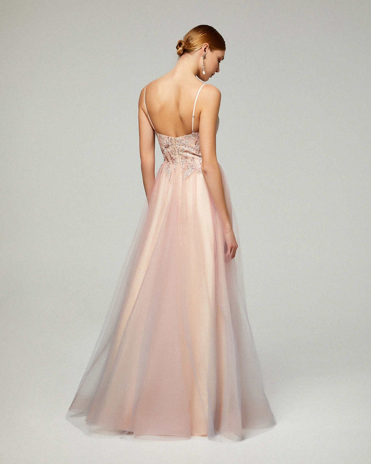 Long evening dress with shining tulle fabric,  top with lace and beading