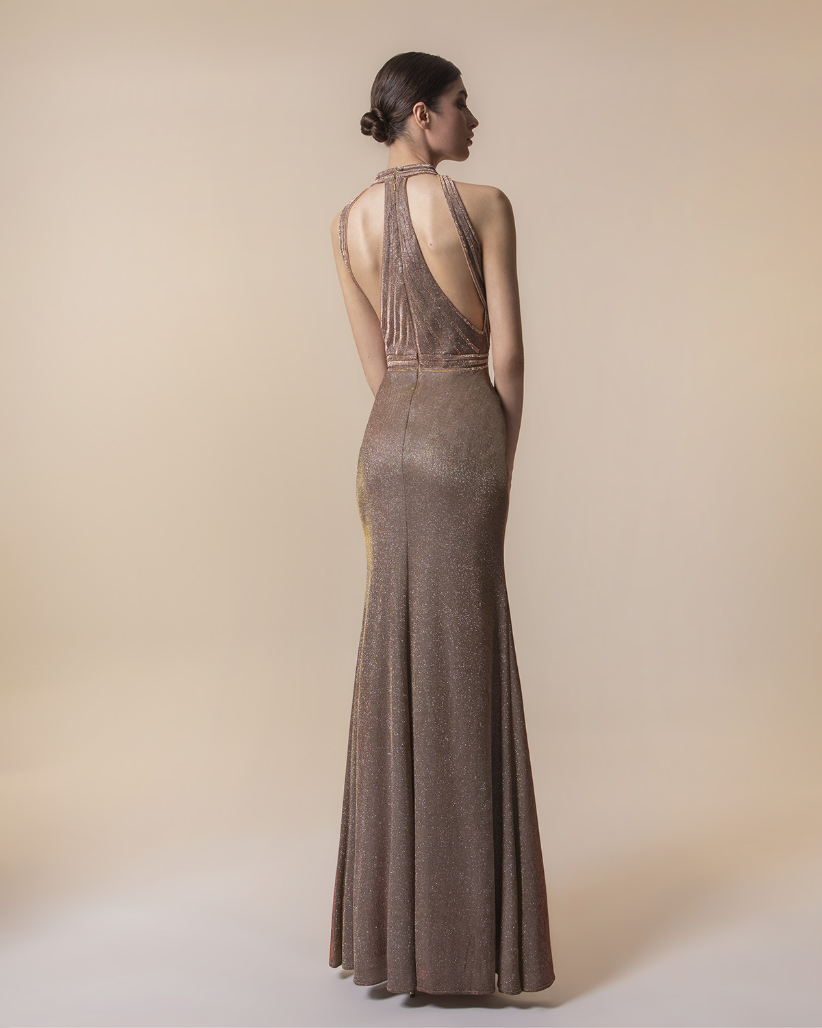 Evening Dresses / Long evening dress with shining fabric with fully beaded top