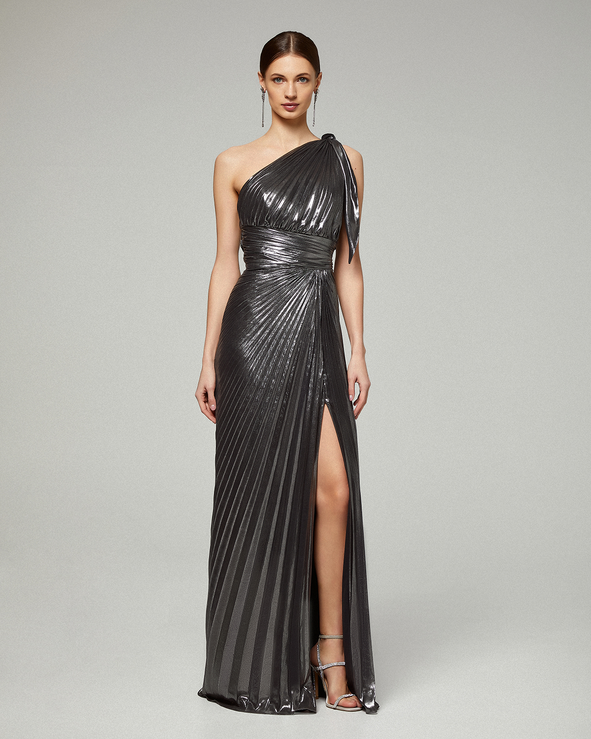 One shoulder long evening pleated dress with shining fabric