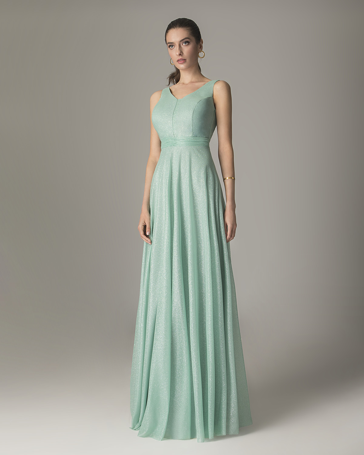 Long cocktail dress with shining fabric and wide straps
