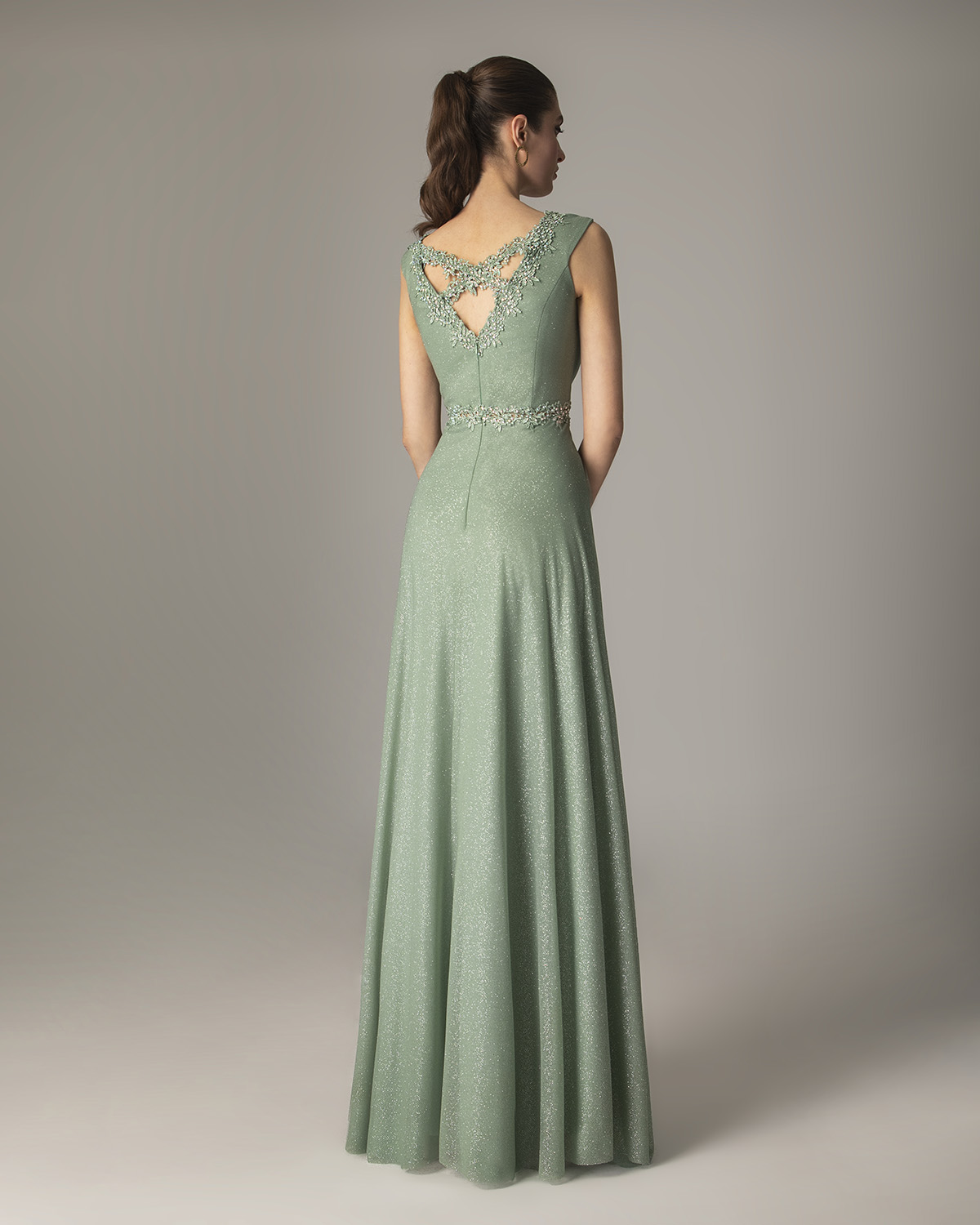 Cocktail Dresses / Long dress with shining fabric and beading on the waist and the top