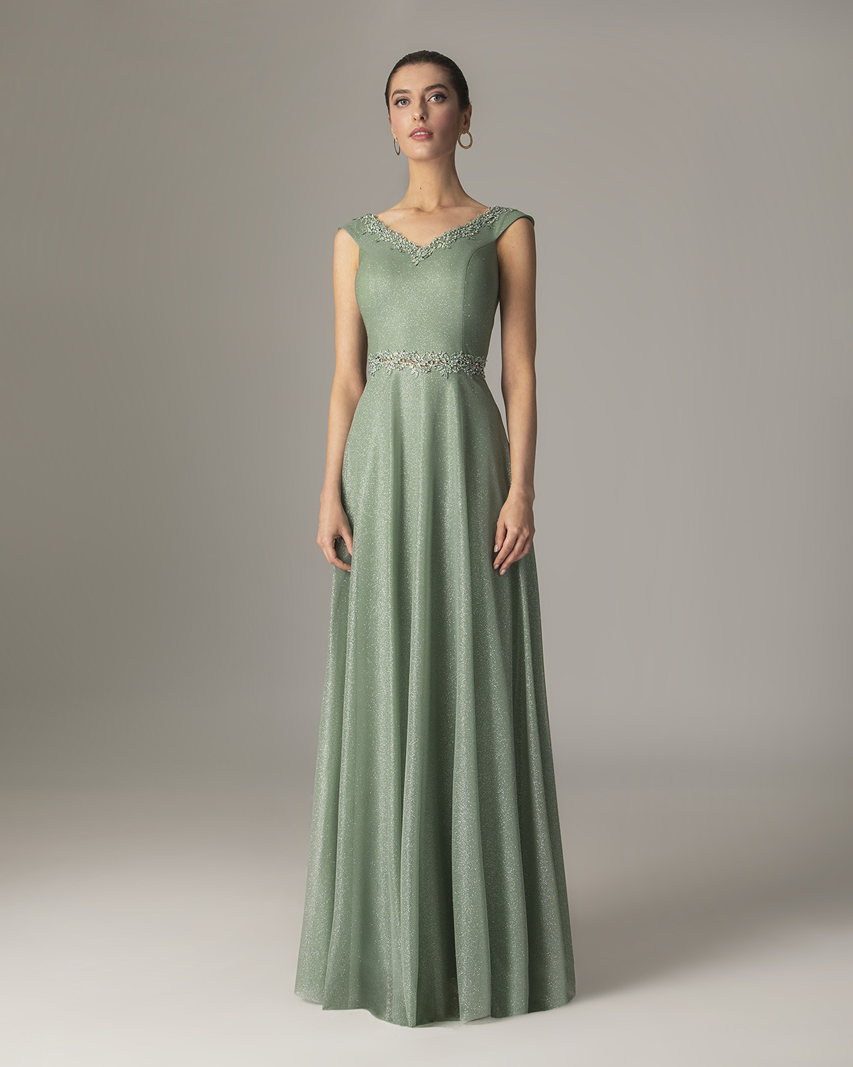 Cocktail Dresses / Long dress with shining fabric and beading on the waist and the top