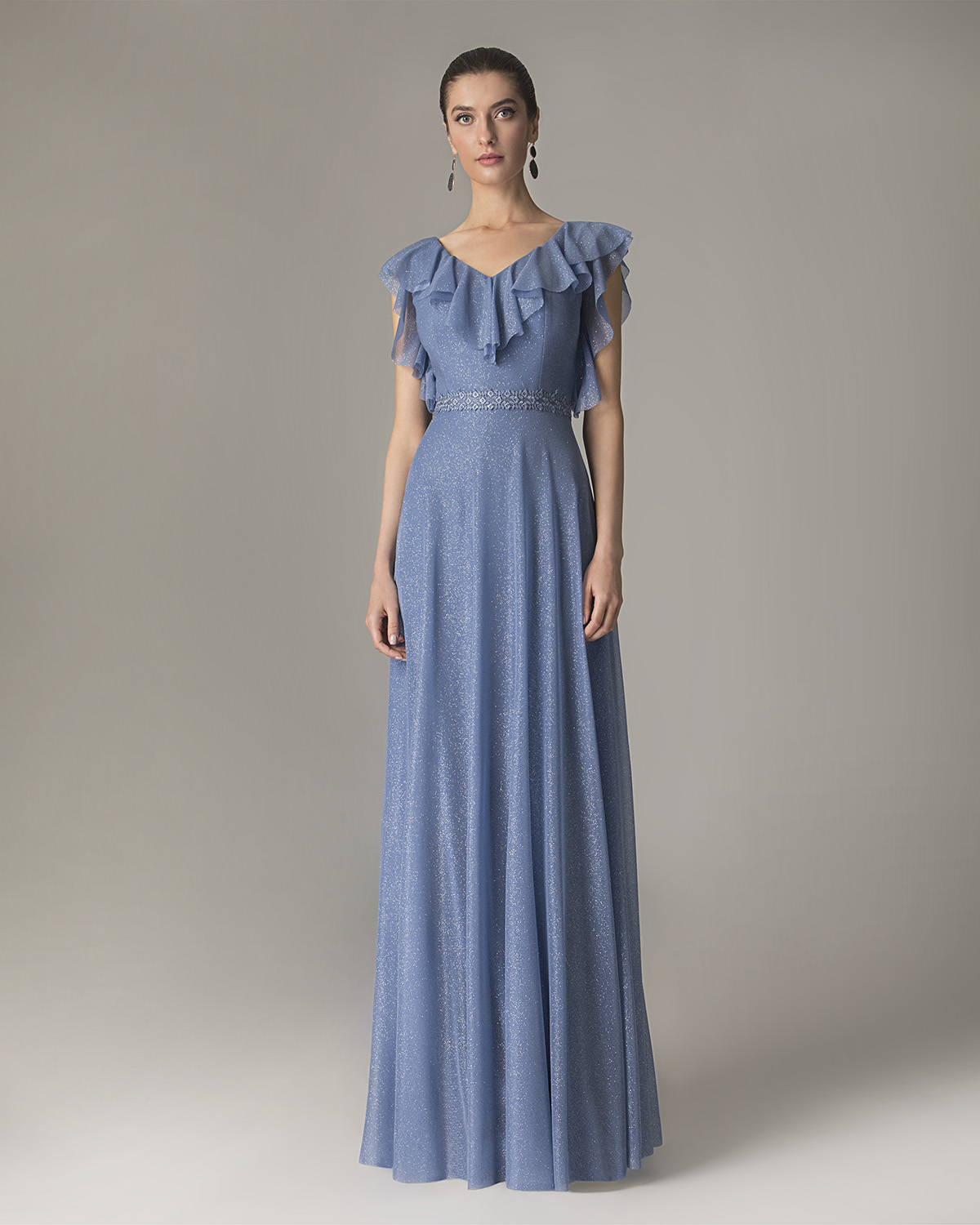 Long shining dress with ruffles on the sleeves and lace on the waist