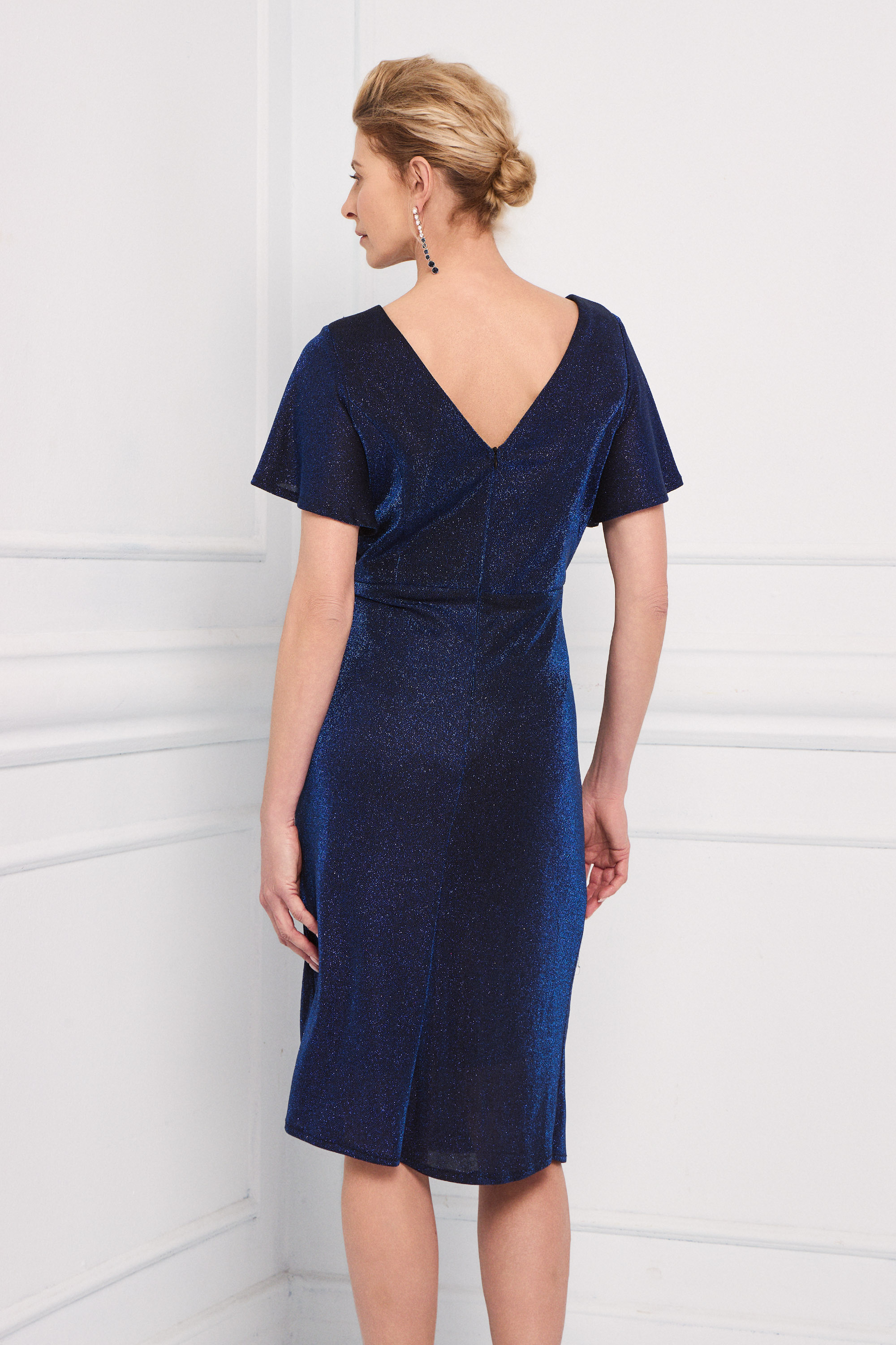 Classic Dresses / Classic short dress made of shiny fabric with short sleeves and embroidery on the side