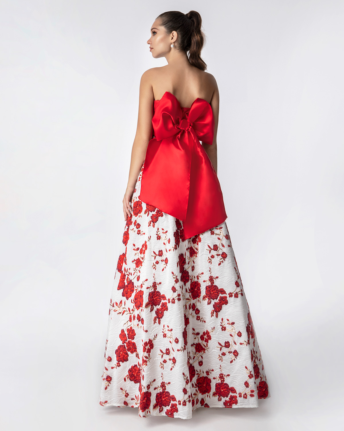 Cocktail Dresses / Long printed brocade skirt with solid color top and big bow in the back