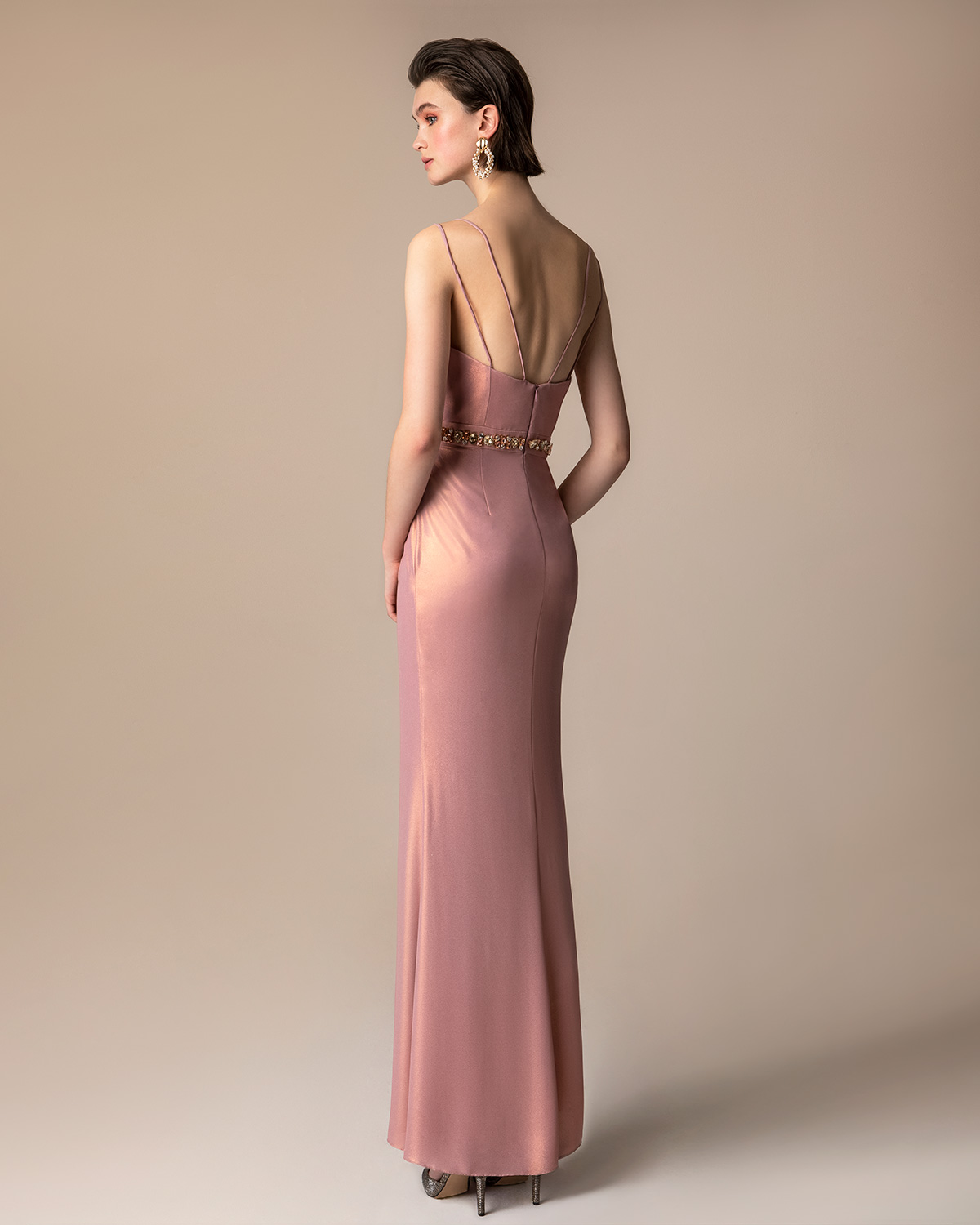 Long evening lurex dress with beading around the waist