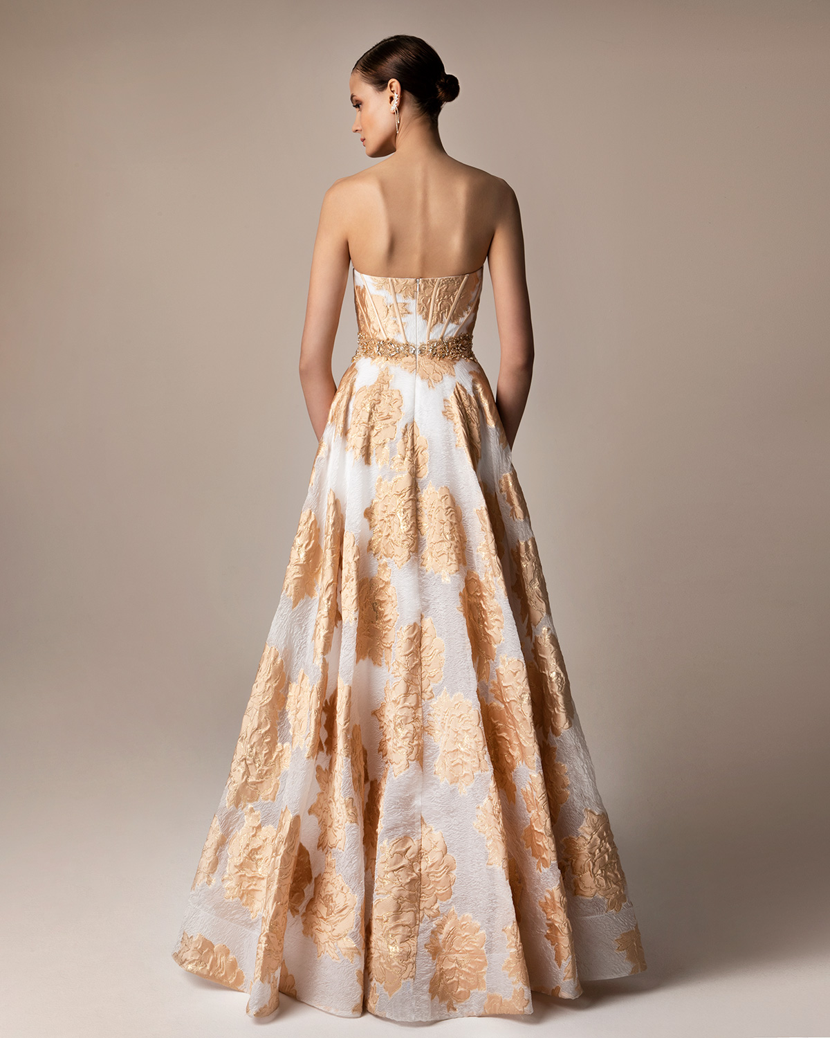 Long evening printed brocade dress with beading around the waist