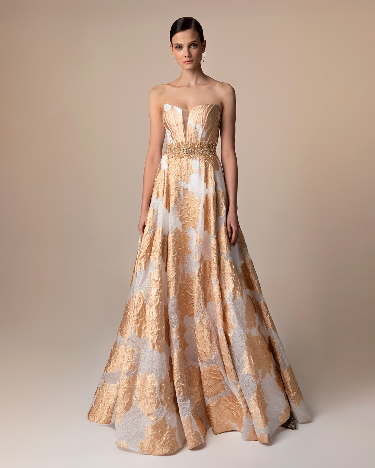 Long evening printed brocade dress with beading around the waist