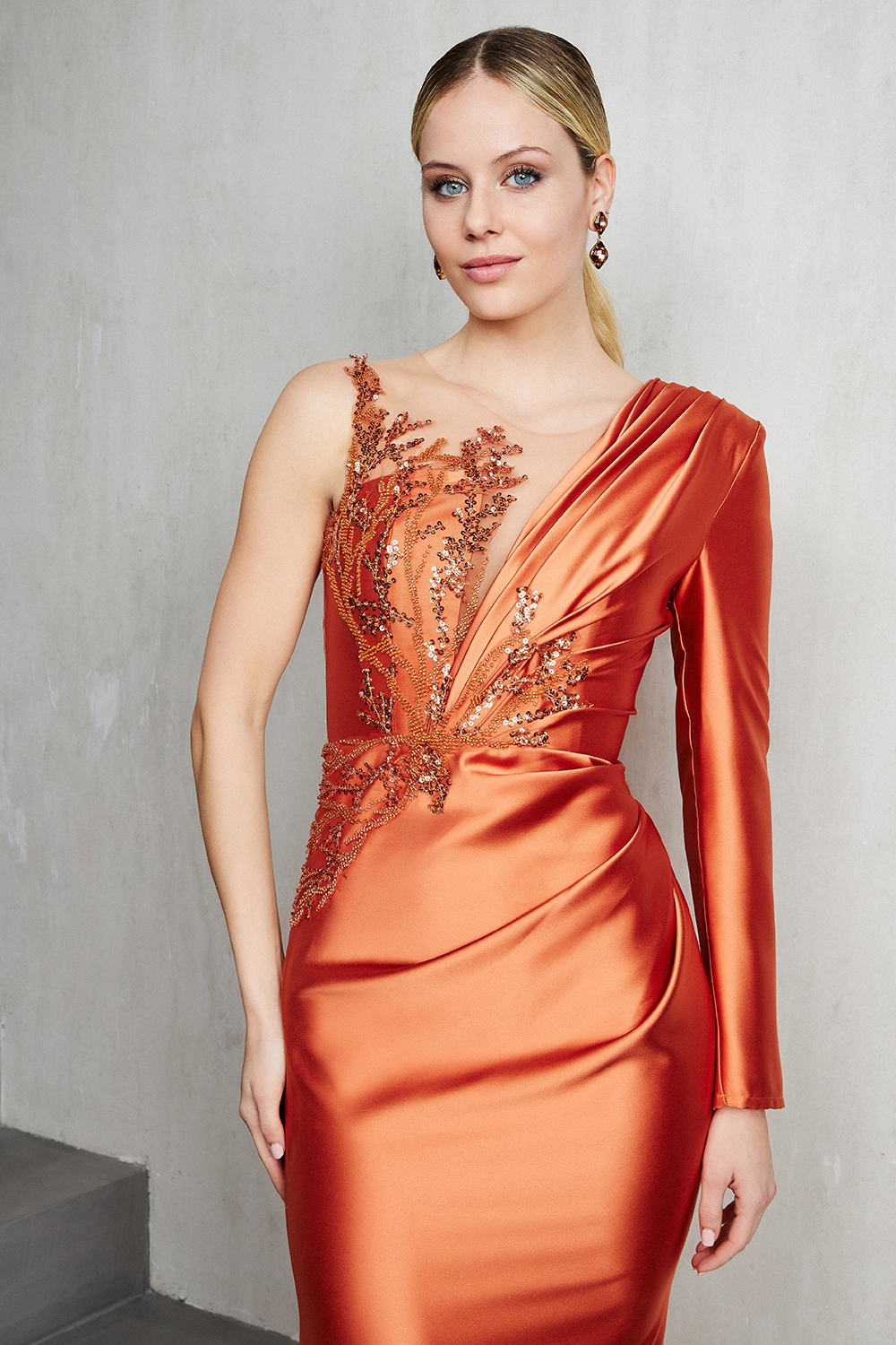 One shoulder satin dress with one long sleeve and beading