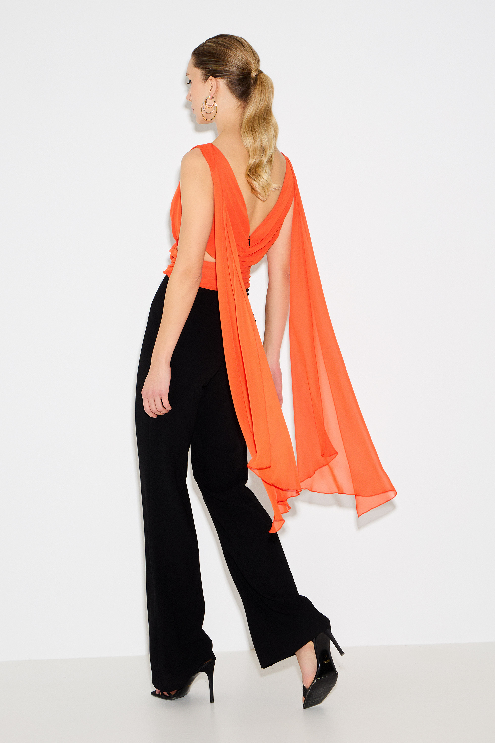 Cocktail Dresses / Cocktail jumpsuit made of crepe with chiffon top, openings, and embroidery