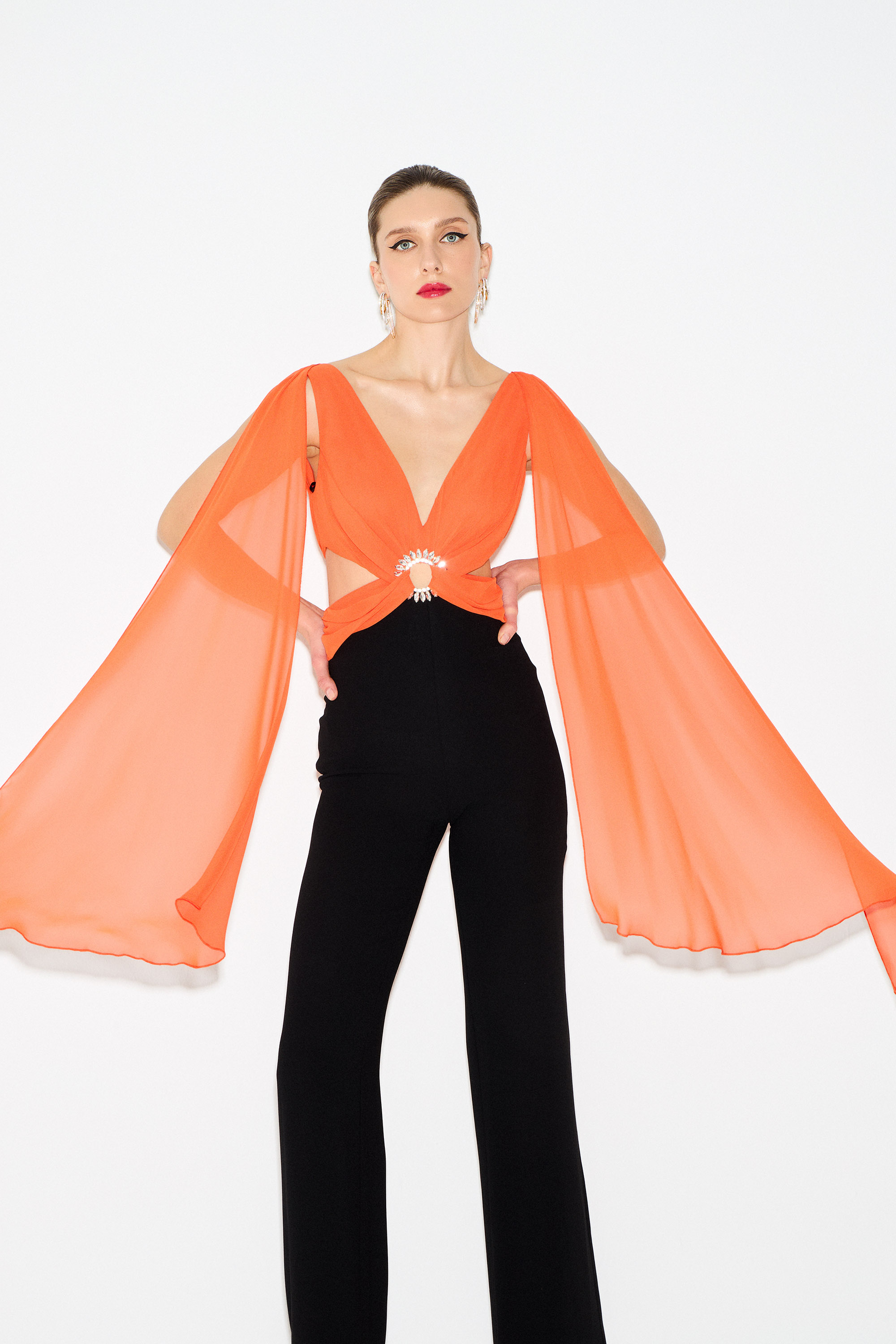 Cocktail Dresses / Cocktail jumpsuit made of crepe with chiffon top, openings, and embroidery